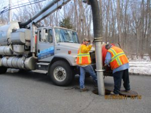 sewer maintenance workers